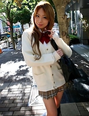 Remika Uehara poses on the street