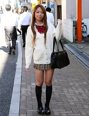 Remika Uehara poses on the street