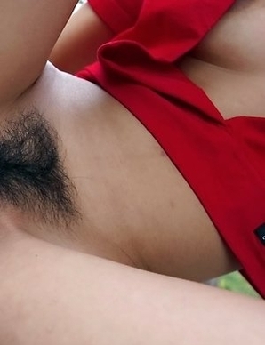 Hot asian brunette Yoko Hasegawa pushing pussy outdoors