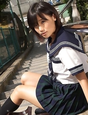Japan teen Yuzuki Hashimoto in sailor gal uniform is playful outdoor
