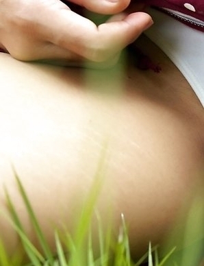 Young Asian cutie Milk Yada spreading pussy in outdoors