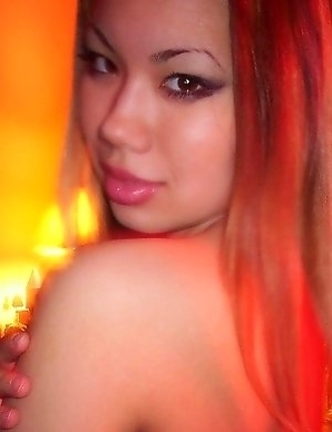 Smoking hot asian teen babe spreads her pussy lips