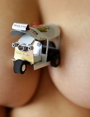 Chubby and cute Thai Wa with beautiful heavy-hangers pleasing white traveler in hotel room