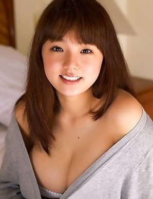 Ai Shinozaki with huge knockers plays with pillows in bed