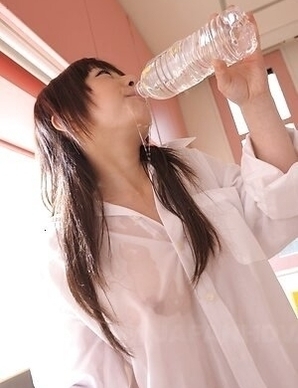 Miku Tamaru in white shirt shows big tits and enjoys drinking water.