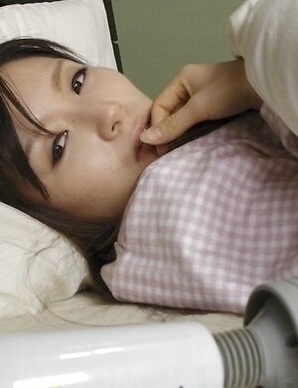 Hitomi Tsukishiro gets horny and uses toy on her pussy before sleep.