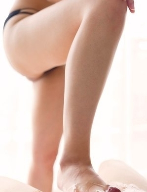 Natsuki Yokoyama enjoys trampling and footjobs in a femdom-y gallery